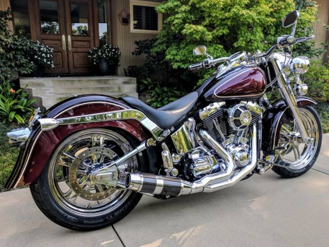 D&D - D&D Bob Cat Upswept 2 into 1 Chrome with Carbon Fiber Sleeve 84-17 Softail